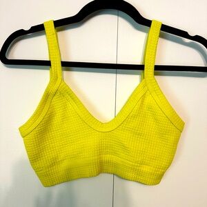 Neon green cropped tank top with a racerback design and thin straps. - Sz. sm
